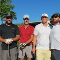 Golfers posing for picture